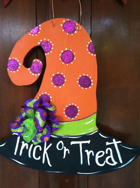 Embrace the Magic of Halloween with a Witch Themed Door Hanger